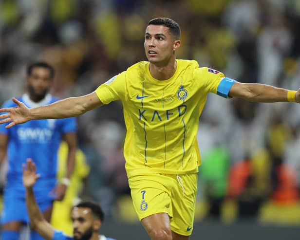 Cristiano Ronaldo celebrates a goal in the Arab Club Champions Cup.