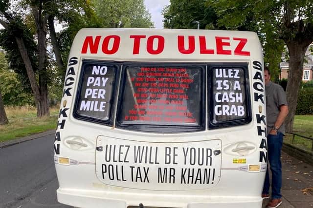 The van also features a picture of the mayor accompanied by a speech bubble stating: "Pay me £12.50 and you can pollute for 24 hours."