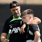 Liverpool manager Jurgen Klopp speaks to Ben Doak. Picture: Andrew Powell/Liverpool FC via Getty Images