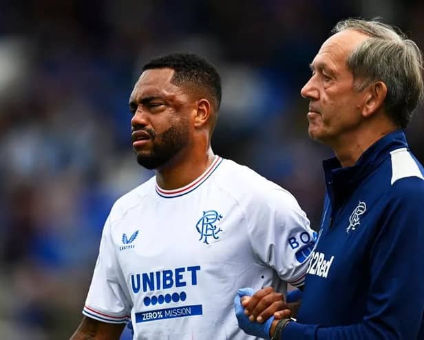 Rangers striker Danilo is forced off with a serious head knock after colliding with St Johnstone defender Liam Gordon