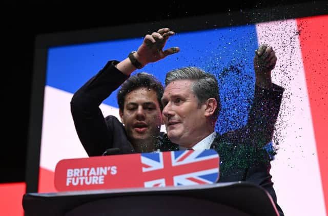 Keir Starmer is interrupted by a heckler. Credit: Getty