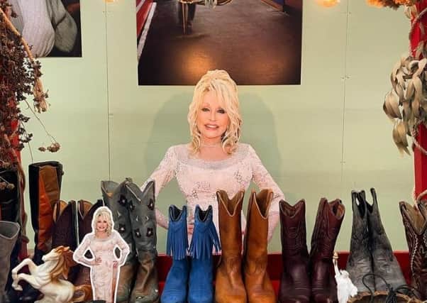 Dolly Parton is an important part of the Cowpeople aesthetic, and her visage graces the stall every weekend - often adorned in different western accessories up for sale