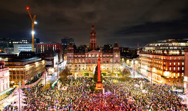 Crowds and Performers gather for the Glasgow Christmas Lights switch on at George Square, on November 20, 2022, in Glasgow, Scotland.
