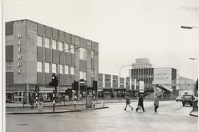 A black and white picture of Duke Street in Hamilton Town Centre