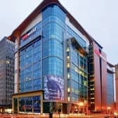 The tallest cinema complex in the world is the Cineworld on Renfrew street in Glasgow, with an overall height of 62 m (203.41 ft). Opening its doors on 21 September 2001, at 12 stories high it holds 18 screens and has a seating capacity of 4,277.