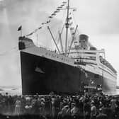The Cunard White Star liner Queen Mary leaving the dock at Southampton on her maiden voyage, 27th May 1936