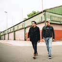 Dante and Jools of Gun walking through the Barras - they will play a live set at the RESONATE music industry show later this month.