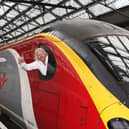 Sir Richard Branson promotes Virgin Trains at Liverpool Lime Street Station. Image: Tony Woolliscroft/Getty Images