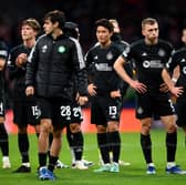 Celtic players look dejected after the team's defeat 