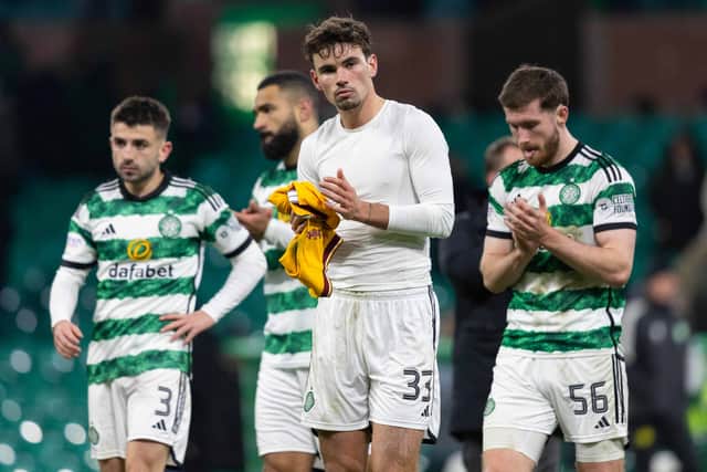 Celtic's Greg Taylor, Matt O'Riley and Anthony Ralston look dejected at full-time