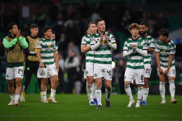 Celtic players applaud fans after the UEFA Champions League group E football match between Celtic and Lazio at Parkhead