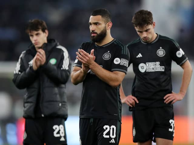 Cameron Carter-Vickers of Celtic acknowledges the fans with teammates following the 2-0 defeat to Lazio