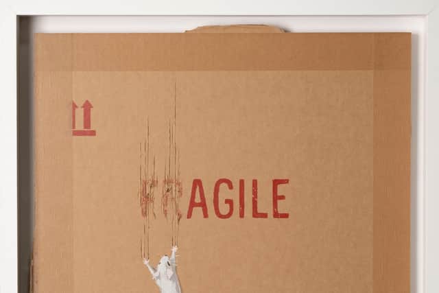 A close-up of the Agile screenprint by Banksy set to go on auction in Glasgow next month.