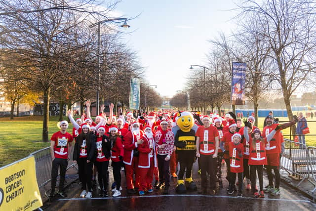 Santas get ready at the starting line of the Beatson Cancer Charity Santa Dash 2022 in Glasgow Green