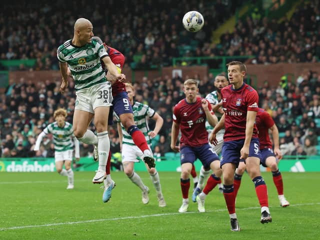 Daizen Maeda of Celtic heads at goal against Kilmarnock