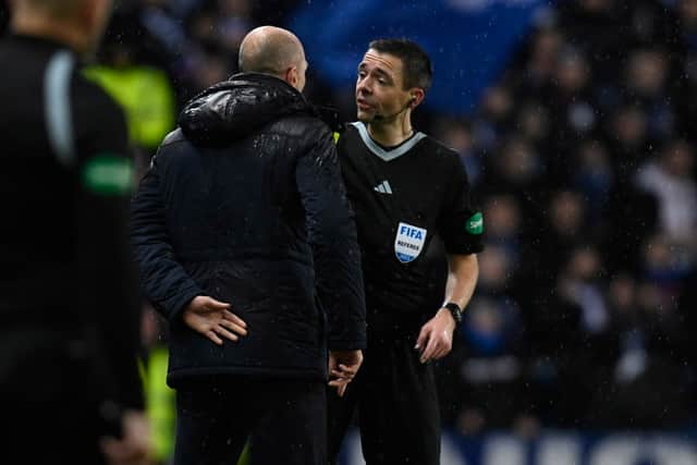 Rangers manager Phillipe Clement argues with referee Kevin Clancy before being shown a yellow card