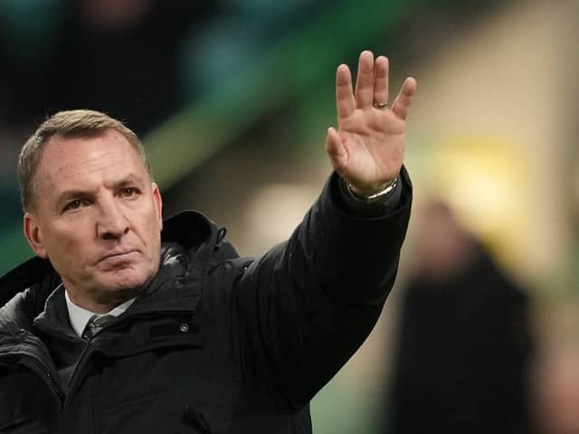 Celtic manager Brendan Rodgers waves to supporters after their 2-1 Champions League victory over Feyenoord. 