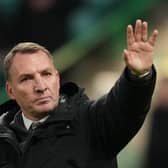 Celtic manager Brendan Rodgers waves to supporters after their 2-1 Champions League victory over Feyenoord. 