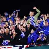 Rangers fans celebrate after their team's 3-2 victory over Real Betis and qualification to the round of 16 in the UEFA Europa League.
