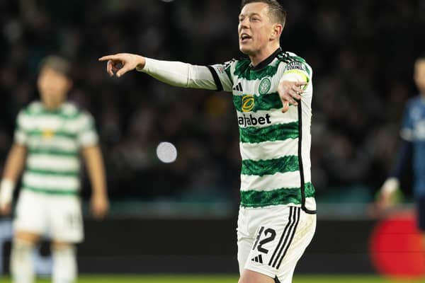Celtic captain Callum McGregor passes on instructions to his team mates during a UEFA Champions League match against Feyenoord.