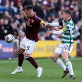 Lawrence Shankland of Hearts holds off Calum McGregor of Celtic at Tynecastle.