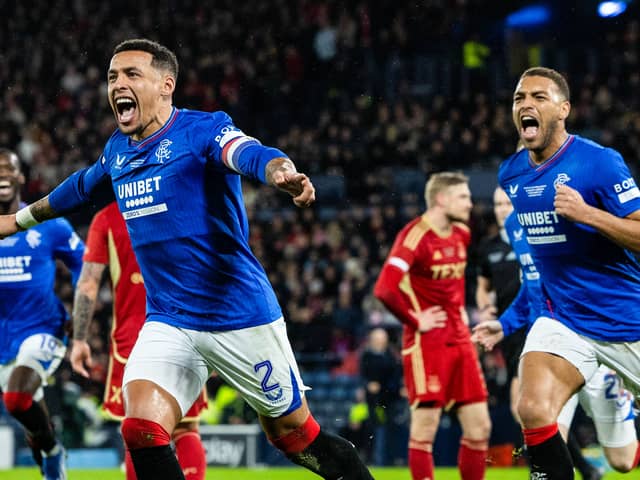 Rangers' James Tavernier celebrates after scoring to make it 1-0 with Cyriel Dessers 