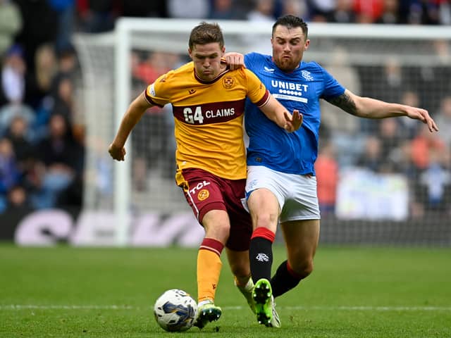 Rangers' John Souttar and Motherwell's Blair Spittal in action