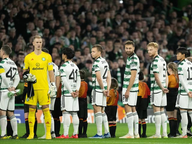 Celtic players line up for the Champions League anthem during a UEFA Champions League match against Lazio 