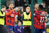 Cyriel Dessers and Rabbi Matondo celebrate his goal at Hibs on Wednesday night. Cr. SNS.