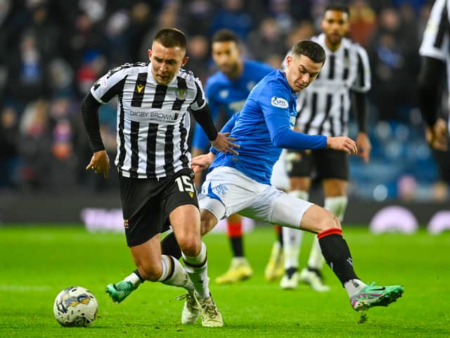 St Mirren's Caolan Boyd-Munce tries to get away from Rangers' Tom Lawrence 