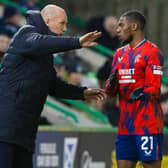 Rangers manager Philippe Clement passes on instructions to Dujon Sterling 