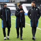 Rangers' Dujon Sterling, Rabbi Matondo and Connor Goldson out inspection the pitch at the SMiSA Stadium