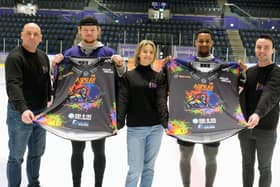 Clan players Alex Forbes, second left and Reece Kelly, fourth left showing the special Pride Night match tops that will be auctioned at the end of the game. Also in pic is Liam Stevenson, left, Claire Rankin, centre and Jordan Daly from the TIE charity.