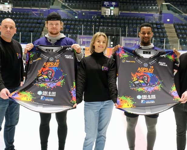 Clan players Alex Forbes, second left and Reece Kelly, fourth left showing the special Pride Night match tops that will be auctioned at the end of the game. Also in pic is Liam Stevenson, left, Claire Rankin, centre and Jordan Daly from the TIE charity.