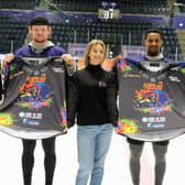 Clan players Alex Forbes, second left and Reece Kelly, fourth left showing the special Pride Night match tops that will be auctioned at the end of the game. Also in pic is Liam Stevenson, left, Claire Rankin, centre and Jordan Daly from the TIE charity.