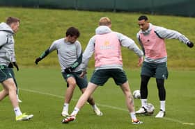 Adam Idah (R) during a Celtic training session at Lennoxtown