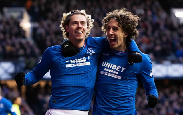 Todd Cantwell celebrates with Fabio Silva after scoring to make it 3-0 against Livingston