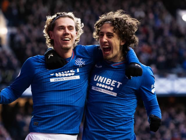 Todd Cantwell celebrates with Fabio Silva after scoring to make it 3-0 against Livingston