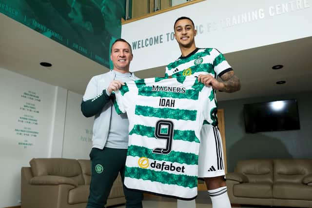 Celtic manager Brendan Rodgers and new signing Adam Idah 