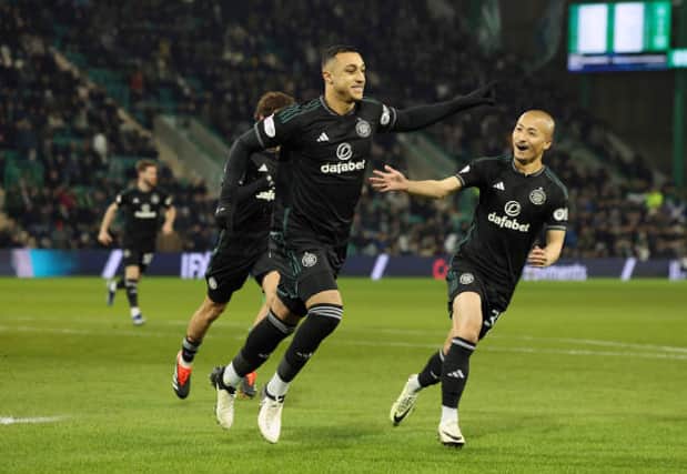 EDINBURGH, SCOTLAND - FEBRUARY 07: Adam Idah of Celtic celebrates scoring the opening goal from the penalty spot during the Cinch Scottish Premiership match between Hibernian FC and Celtic FC at Easter Road on February 07, 2024 in Edinburgh, Scotland. (Photo by Ian MacNicol/Getty Images)