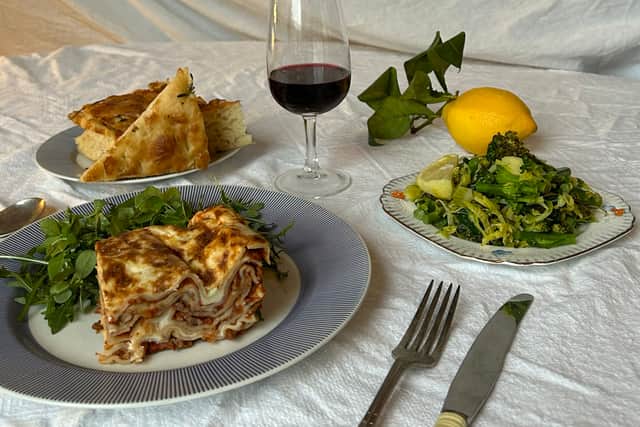 Lasagna, Focaccia, and salad offered by Sauce!