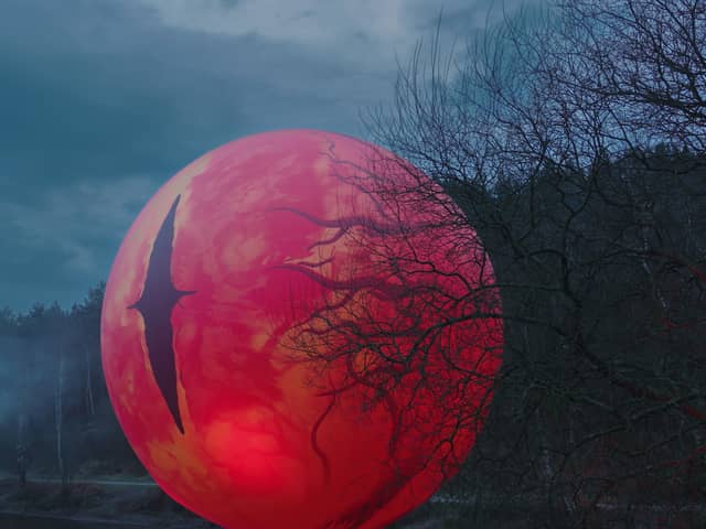 The giant orange 'eye' has appeared is the latest Alton Towers promo for a new ride launch.