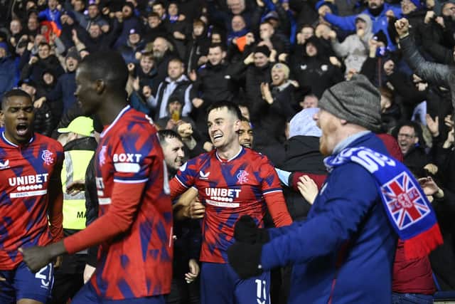 Tom Lawrence celebrates his winning goal with the Rangers fans. Cr. Getty Images.