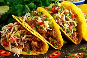 Mexican food - delicious taco shells with ground beef and home made salsa. Image: Grinchh/stock.adobe