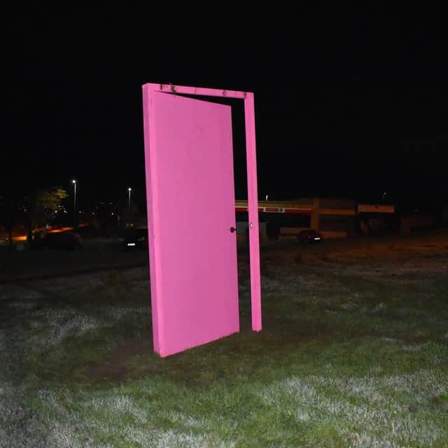 A Big Pink Door in North Motherwell shortly after it's installation at midnight