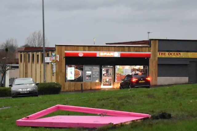 A Big Pink Door the morning after, looking a little bit worse for wear. It stood for 7 and a half hours before it was brought to the ground.