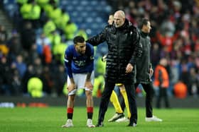 Connor Goldson of Rangers is consoled by Philippe Clement at full-time