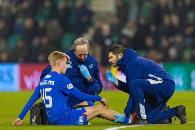 Rangers' Ross McCausland is forced off injured during a Scottish Cup Quarter Final match against Hibernian