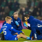 Rangers' Ross McCausland is forced off injured during a Scottish Cup Quarter Final match against Hibernian