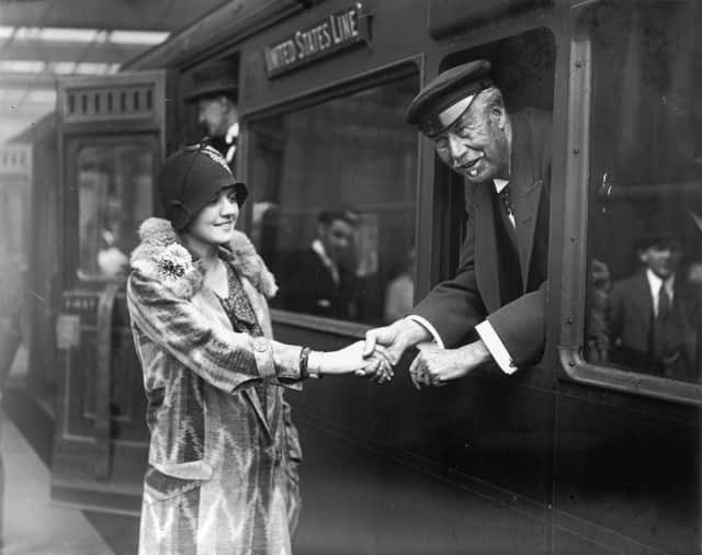 Sir Thomas Lipton meeting a well wisher as he leaves Waterloo Station for New York in pursuit of the America's Cup.